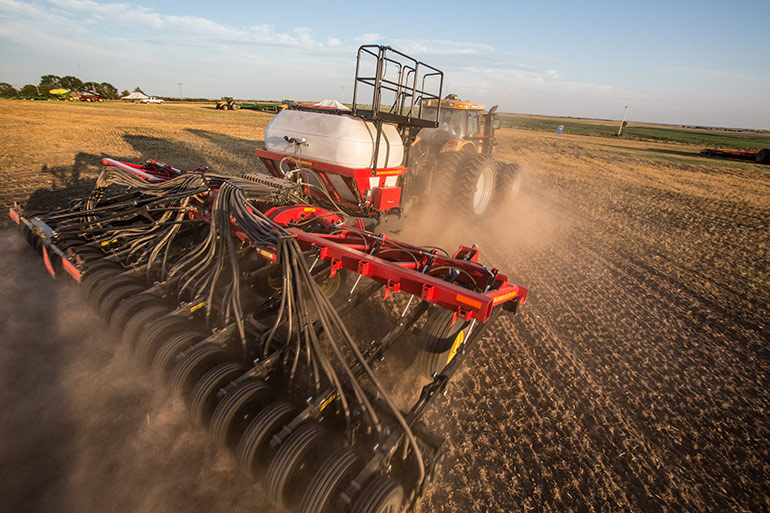 The Sunflower 9830NT Series air drill from AGCO is a field-proven, single-rank, single-disc opener system that delivers the precise, high-speed seeding performance farmers need to plant more acres in less time. The 9830NT provides a large capacity, two-compartment seed tank and a narrow, 11.5-foot transport width to give it exceptional versatility and performance.