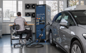 How is EV charging interoperability tested?